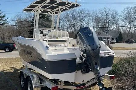 Slide: The Image of 2025 Robalo 200 CC boat on trailer with 150 HP outboard motor. - 9