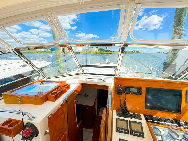 Slide: The Image of Interior view of 1995 Grand Banks 38 Eastbay EX yacht cockpit with navigation equipment. - 12