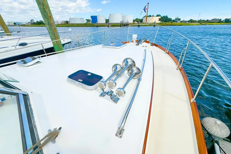 Slide: The Image of 1995 Grand Banks 38 Eastbay EX yacht deck with water view. - 16