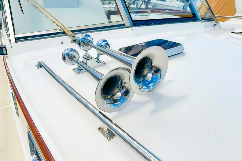 Slide: The Image of Close-up of 1995 Grand Banks 38 Eastbay EX yacht's chrome horns on deck. - 17