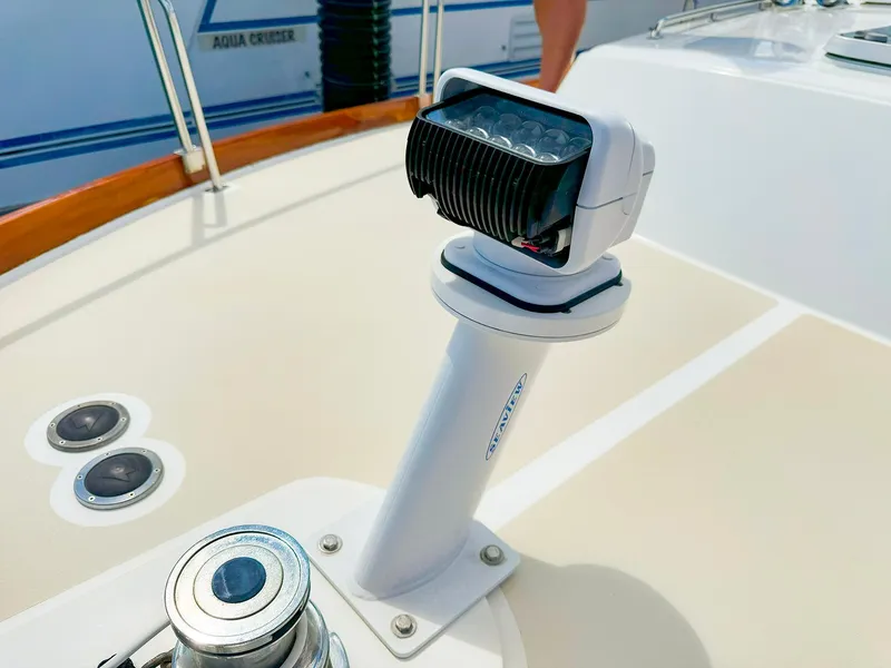 Slide: The Image of 1995 Grand Banks 38 Eastbay EX boat deck with mounted spotlight and winch. - 19