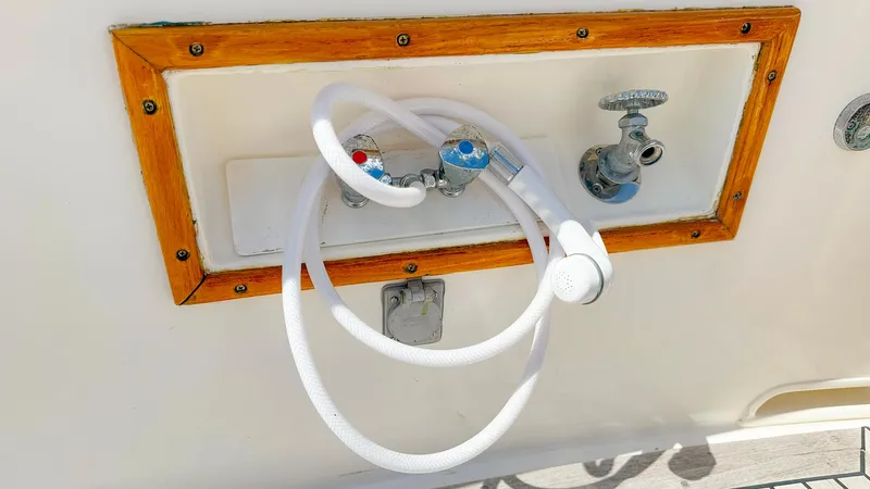 Slide: The Image of Outdoor shower fixture on 1995 Grand Banks 38 Eastbay EX yacht. - 5