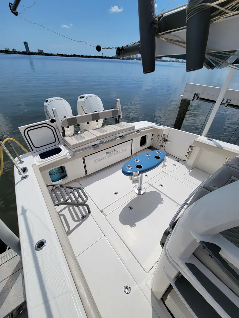 Slide: The Image of 2023 Solace 41 CS boat deck with seating and fishing setup. - 14