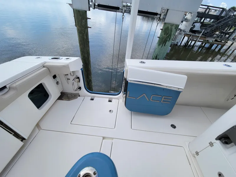 Slide: The Image of 2023 Solace 41 CS boat deck with sleek design and water view. - 20