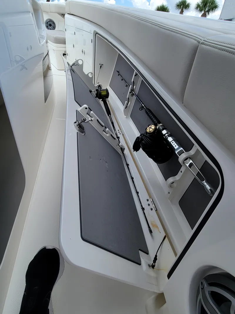 Slide: The Image of 2023 Solace 41 CS boat with fishing rod storage compartment. - 37