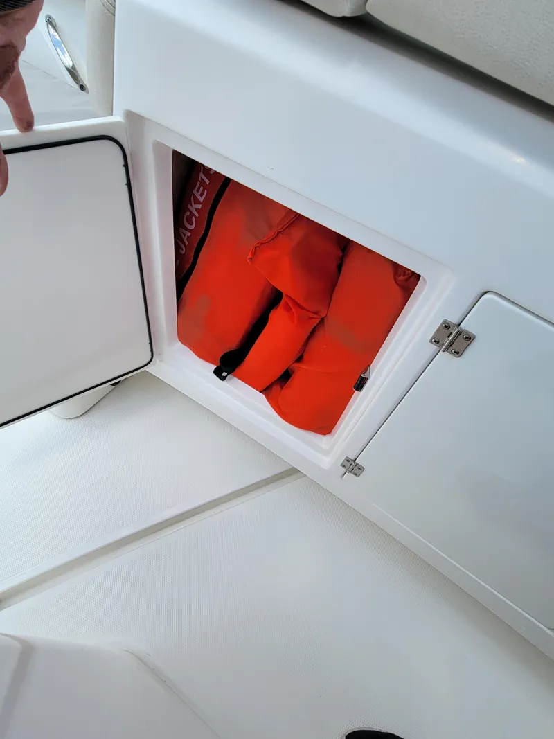 Slide: The Image of 2023 Solace 41 CS boat storage with orange life jackets. - 39