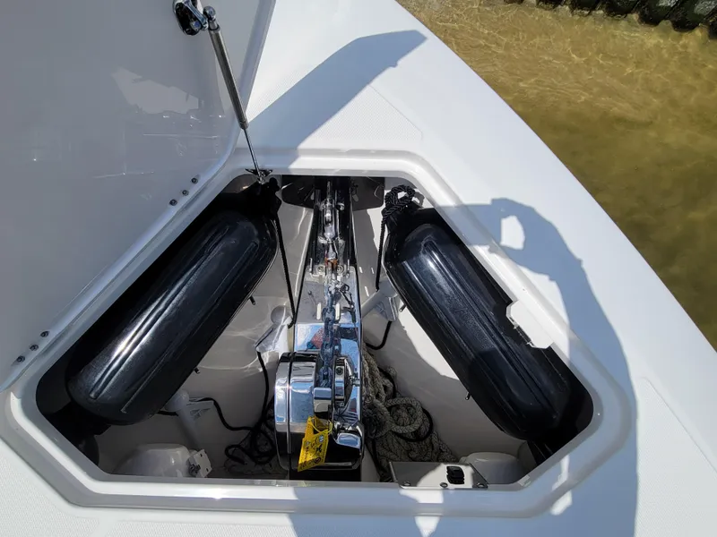Slide: The Image of Anchor compartment of 2023 Solace 41 CS boat with fenders and ropes. - 42