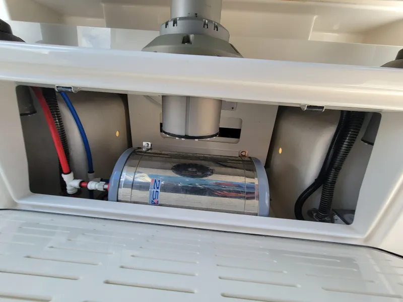 Slide: The Image of 2023 Solace 41 CS boat engine compartment with visible wiring and components. - 7