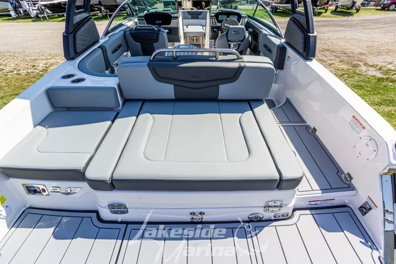 Slide: The Image of 2025 Chaparral 247 SSX boat interior with spacious seating and modern design. - 11