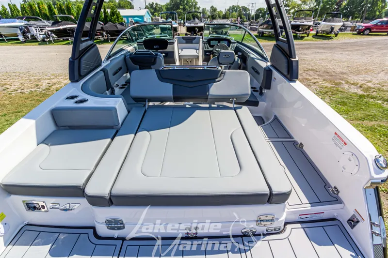 Slide: The Image of 2025 Chaparral 247 SSX boat interior with spacious seating and modern design. - 12