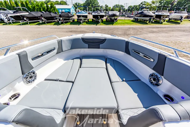 Slide: The Image of 2025 Chaparral 247 SSX boat interior with spacious seating and modern design. - 34