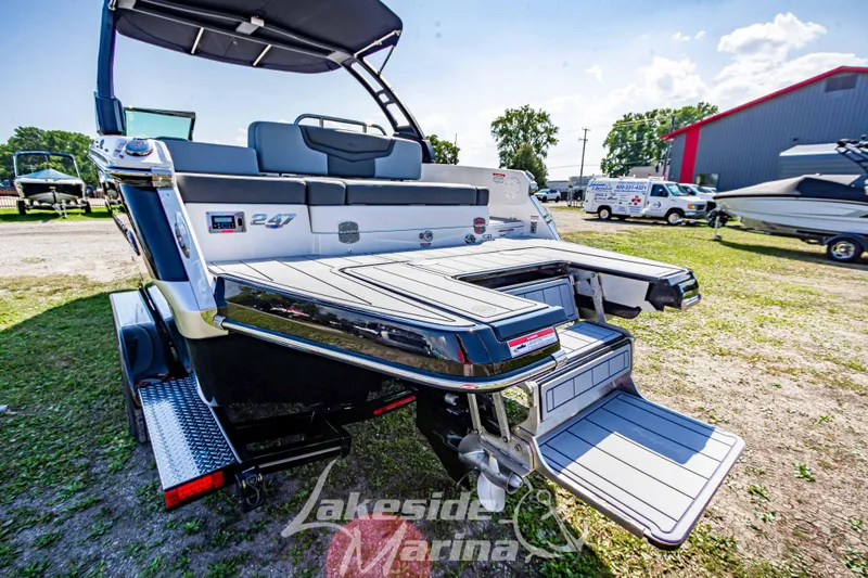 Slide: The Image of 2025 Chaparral 247 SSX boat with sleek design at Lakeside Marina. - 6