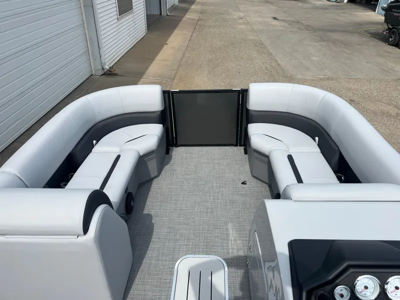Slide: The Image of 2025 Bentley Pontoons Legacy Navigator interior with sleek seating and modern design. - 16