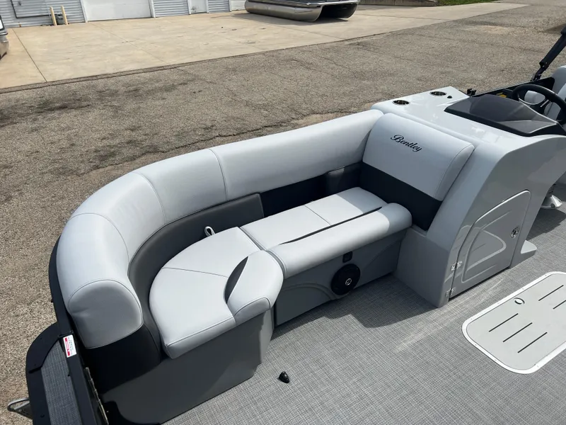 Slide: The Image of 2025 Bentley Pontoons Legacy Navigator with sleek gray seating and modern design. - 8