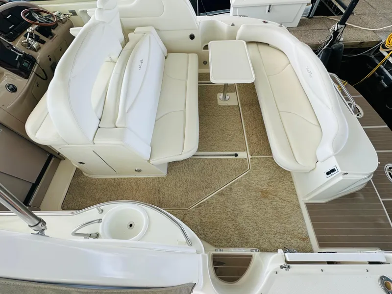 Slide: The Image of Luxurious 2002 Sea Ray 410 Express Cruiser interior with white seating and table. - 20