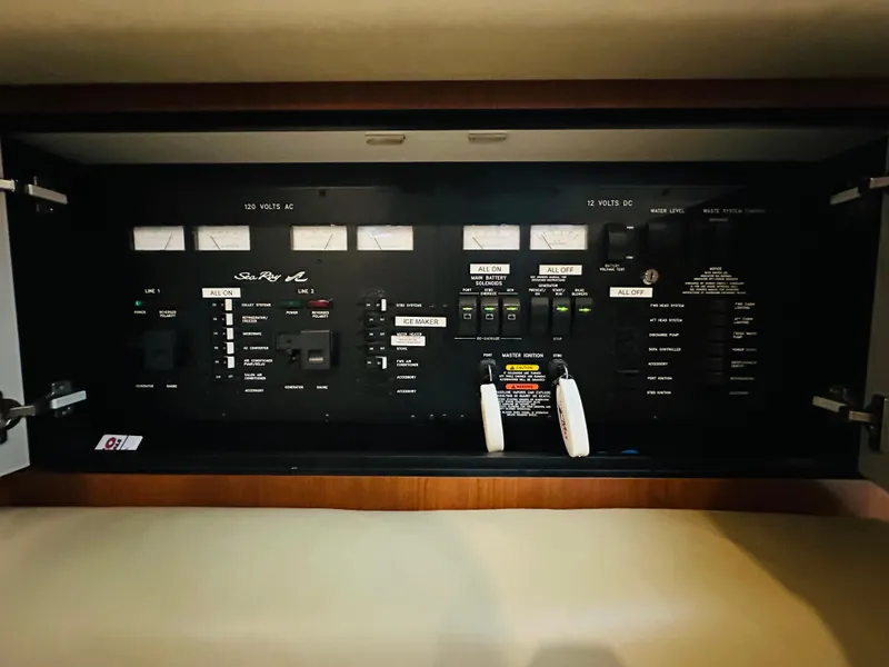 Slide: The Image of Electrical control panel of 2002 Sea Ray 410 Express Cruiser boat. - 41