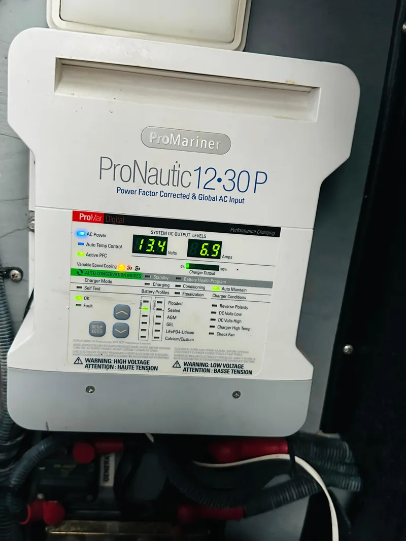 Slide: The Image of ProNautic 12.30P marine battery charger in 2002 Sea Ray 410 Express Cruiser. - 45