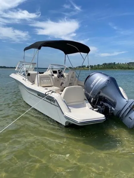 Slide: The Image of 2022 Grady-White Freedom 215 boat with Yamaha engine on clear water. - 1