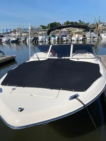 Slide: The Image of 2022 Grady-White Freedom 215 boat docked at marina. - 9