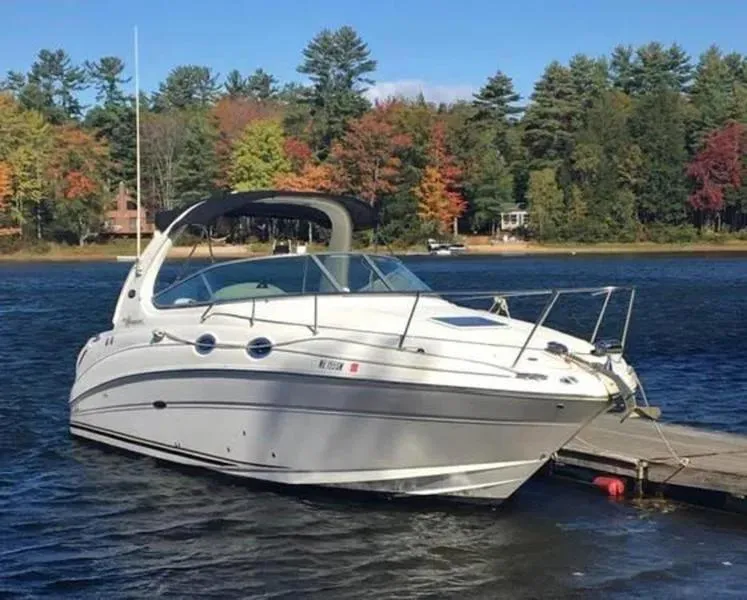 Slide: The Image of 2007 Sea Ray 280 Sundancer docked on a scenic lake with autumn trees. - 6