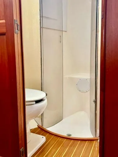 Slide: The Image of Bathroom interior of 1997 Ocean Yachts 60 Super Sport with shower and toilet. - 22