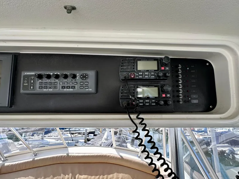 Slide: The Image of Control panel of a 1997 Ocean Yachts 60 Super Sport with communication equipment. - 28
