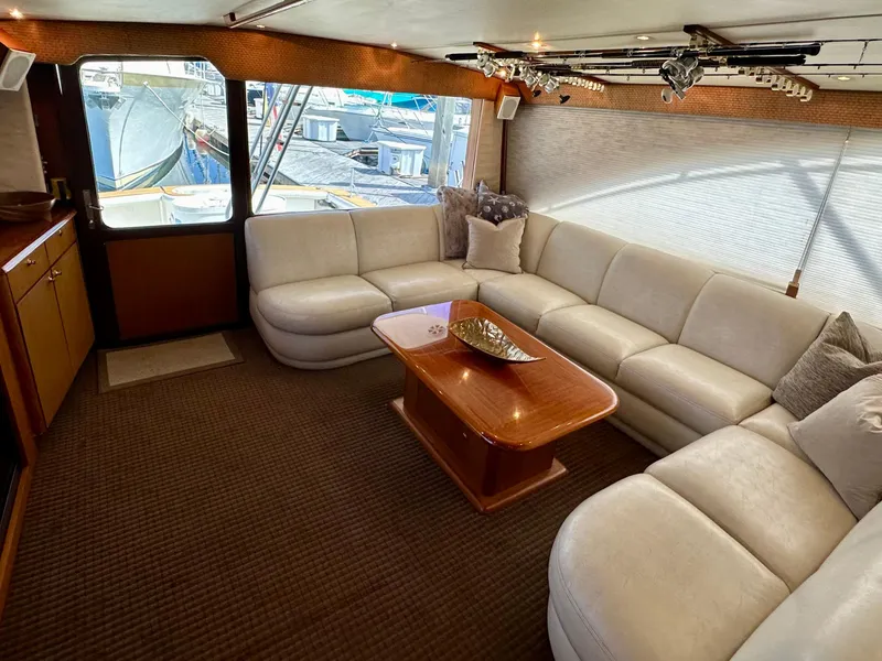 Slide: The Image of Luxurious interior of 1997 Ocean Yachts 60 Super Sport with plush seating and elegant decor. - 5