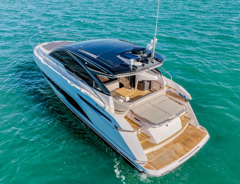 Slide: The Image of 2024 Fairline Targa 45 GT luxury yacht cruising on clear blue water. - 1