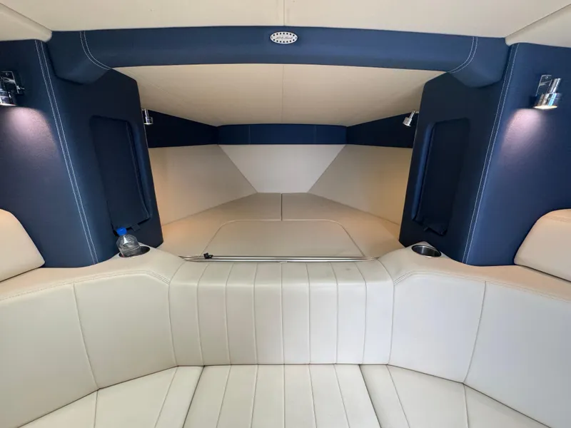 Slide: The Image of Interior of 2013 Nor-Tech 420 Monte Carlo boat with luxurious seating. - 15
