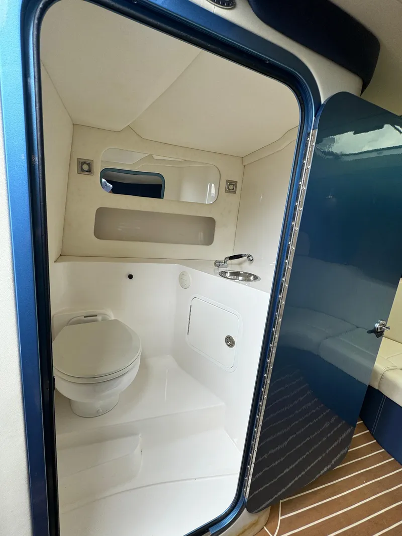 Slide: The Image of 2013 Nor-Tech 420 Monte Carlo bathroom with modern fixtures and sleek design. - 17