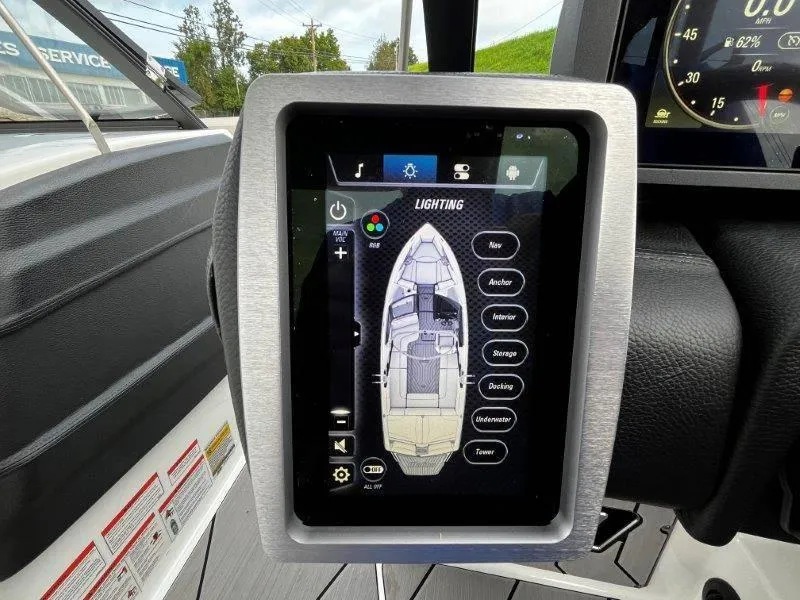 Slide: The Image of Touchscreen control panel in 2020 Malibu 25 LSV boat, displaying lighting options. - 16