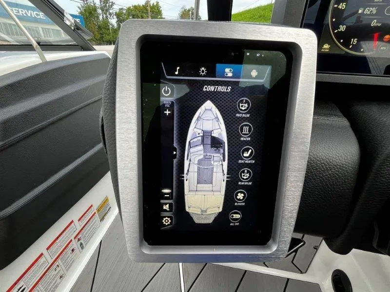 Slide: The Image of Touchscreen control panel of a 2020 Malibu 25 LSV boat. - 21