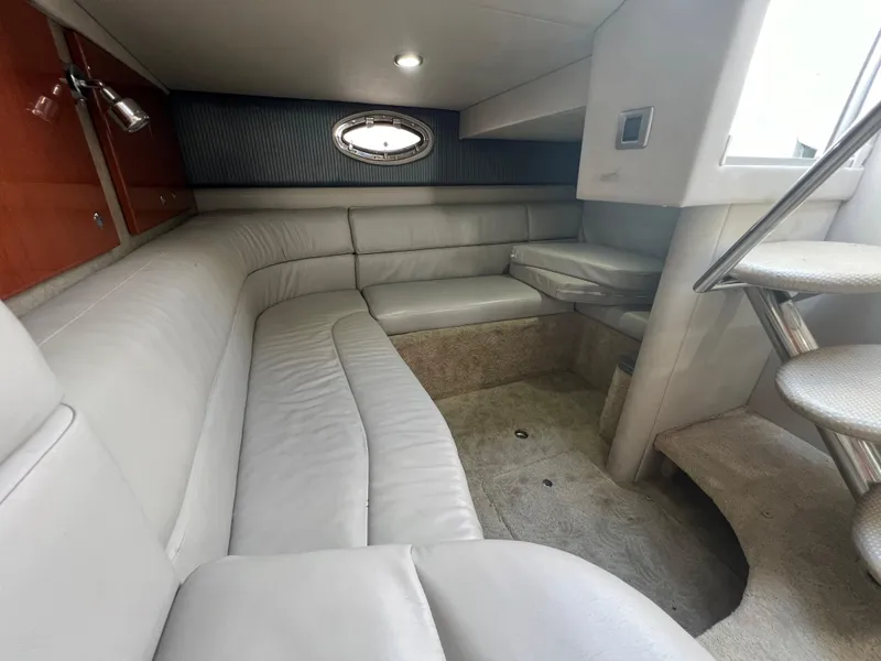 Slide: The Image of Interior of 2006 Formula 31 Cruiser with plush seating and modern design. - 12