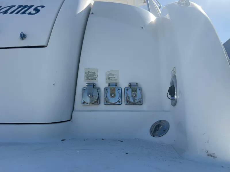 Slide: The Image of 2006 Formula 31 Cruiser boat stern with utility connections and fittings. - 13
