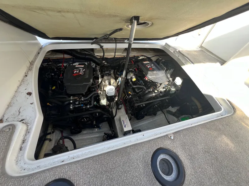 Slide: The Image of 2006 Formula 31 Cruiser engine compartment with dual engines, open hatch view. - 14