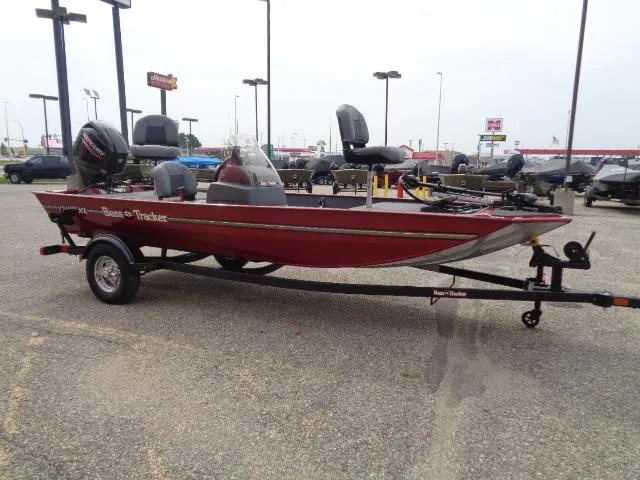 Slide: The Image of 2024 Tracker Bass Tracker Classic XL boat on trailer in parking lot. - 5