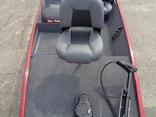 Slide: The Image of 2024 Tracker Bass Tracker Classic XL boat interior with seating and controls. - 8