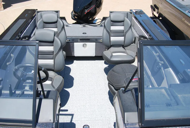 Slide: The Image of 2024 Ranger VX1888 WT boat interior with gray seating and windshield. - 4