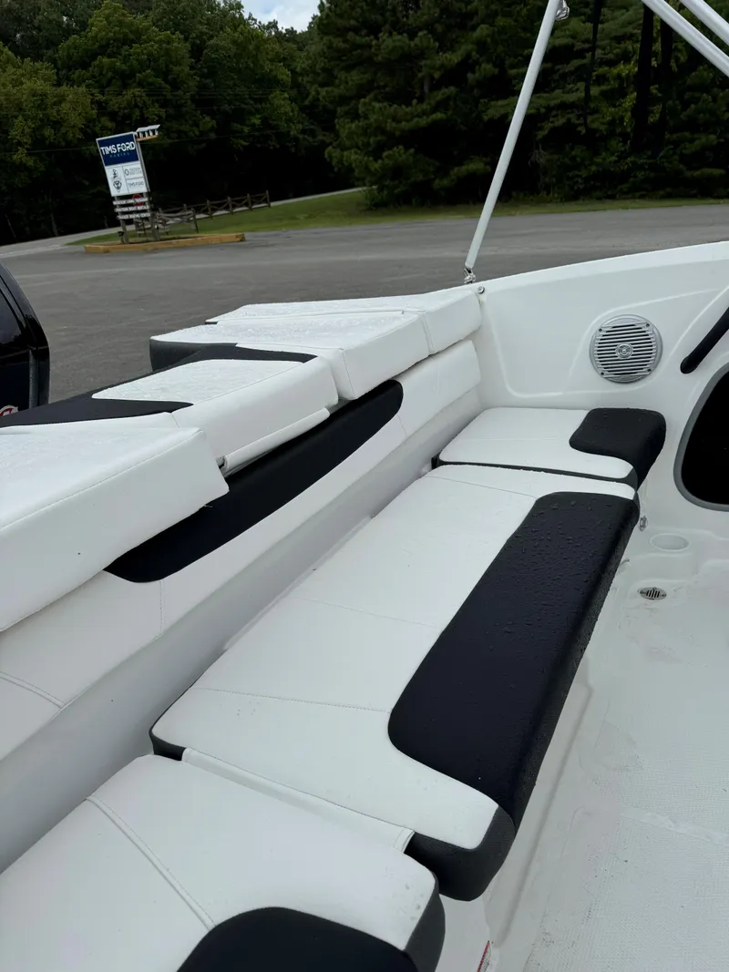 Slide: The Image of 2024 Tahoe 185 S boat interior with white and black seating. - 4