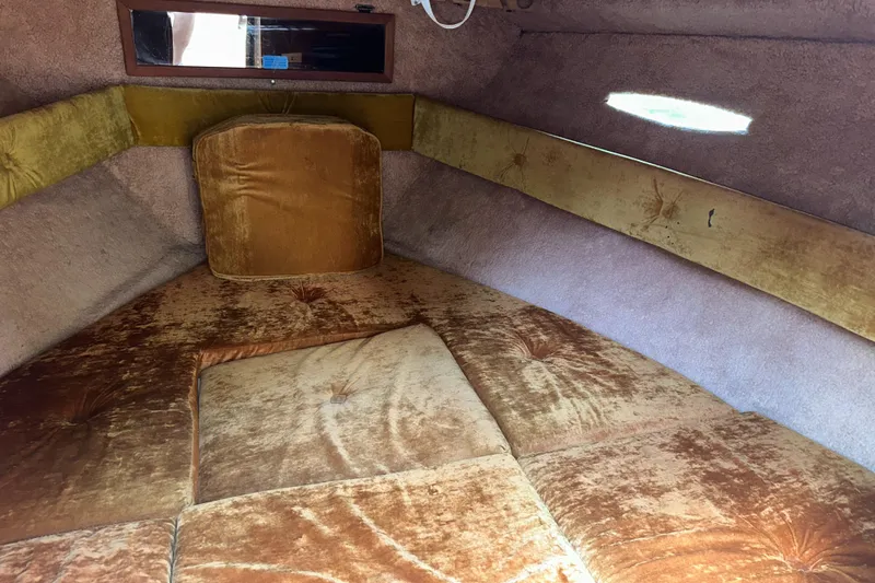 Slide: The Image of Interior of 1981 Sea Ray V240 boat with vintage brown upholstery. - 14