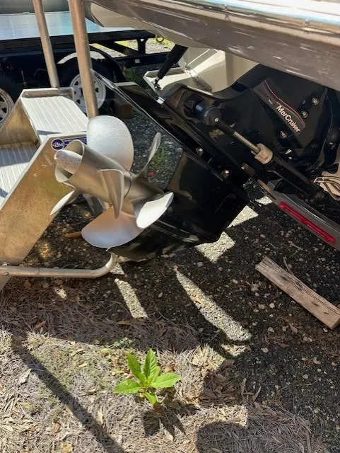 Slide: The Image of 2021 Crownline 220SS boat propeller and outdrive detail in sunlight. - 17