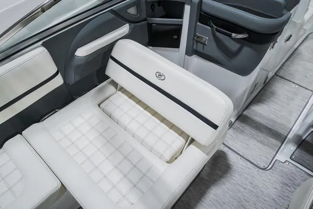 Slide: The Image of Luxurious interior seating of 2021 Cobalt R5 Surf boat with elegant white upholstery. - 17