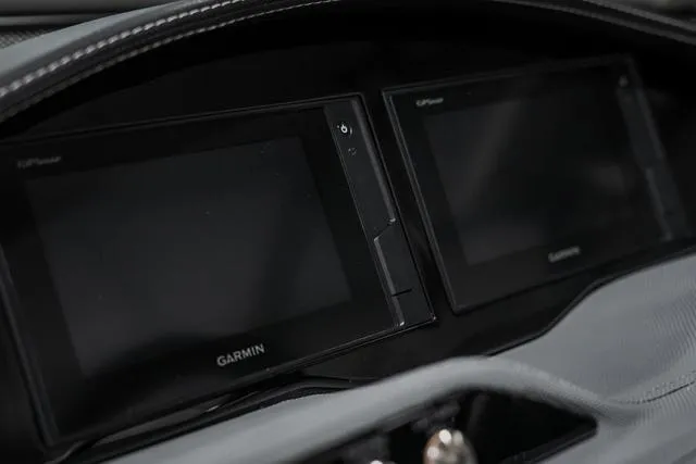 Slide: The Image of 2021 Cobalt R5 Surf dashboard with Garmin displays. - 22