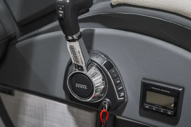 Slide: The Image of Volvo Penta throttle control in 2021 Cobalt R5 Surf boat cockpit. - 27