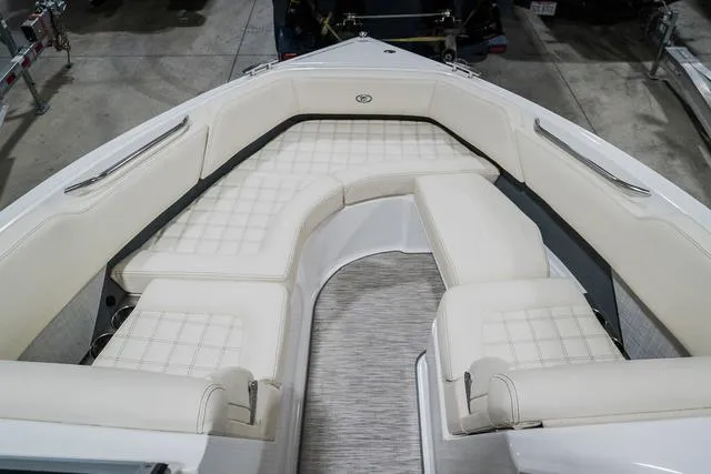 Slide: The Image of 2021 Cobalt R5 Surf boat with luxurious white seating and spacious interior. - 28