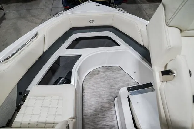 Slide: The Image of 2021 Cobalt R5 Surf boat interior with white seating and modern design. - 29