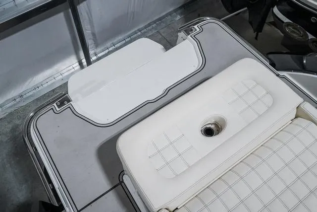 Slide: The Image of 2021 Cobalt R5 Surf boat interior with white cushioned seating. - 8