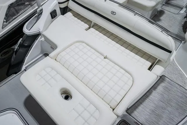 Slide: The Image of 2021 Cobalt R5 Surf boat interior with white cushioned seating and sleek design. - 9