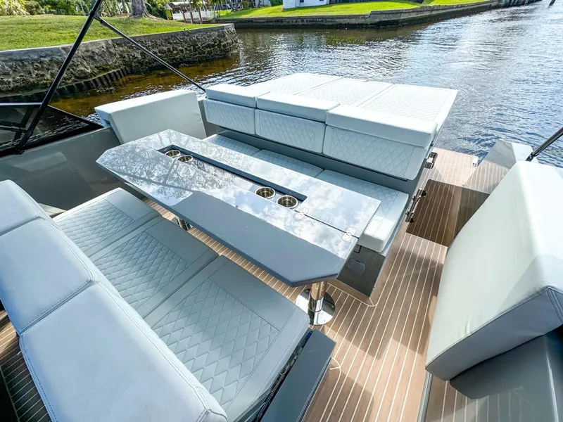 Slide: The Image of 2024 De Antonio Yachts D28 Cruiser interior with sleek seating and modern design. - 15