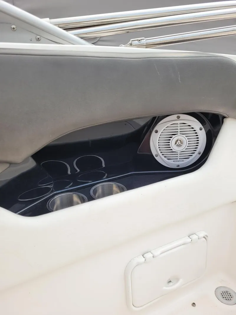 Slide: The Image of Interior of 2008 Regal ES2000 boat with Kenwood speaker and cup holders. - 13